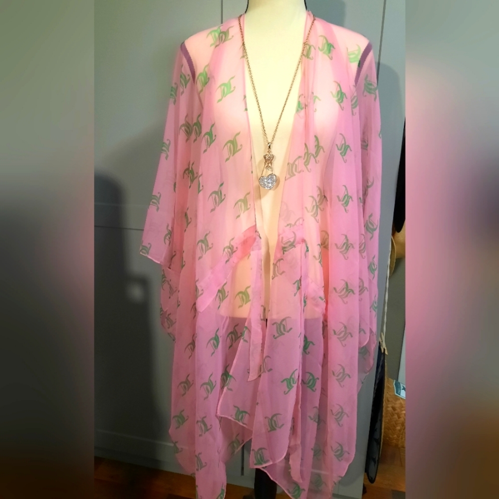 Hard to find Juicy Couture bathing suit cover up with necklace. Both NWT